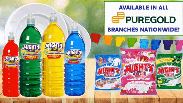 several bottles of mighty clean products are lined up on a table