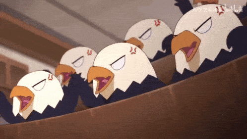 a group of bald eagles are sitting in a row with their eyes closed