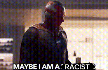 a man in a superhero costume says `` maybe i am a racist '' .