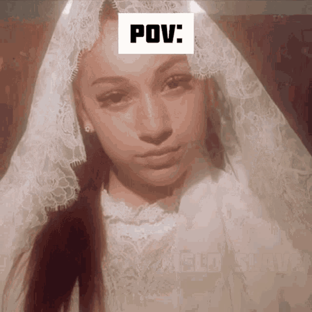 a woman in a white dress with a veil on her head has the word pov above her face