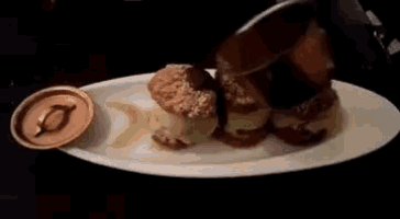 a close up of a plate of food with a spoon