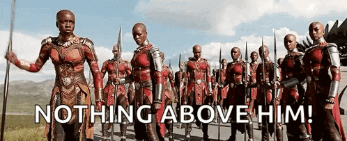 a group of soldiers are marching in a line with spears in their hands and the words `` nothing above him ! ''