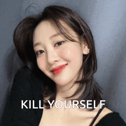 a picture of a woman with the words kill yourself written below her
