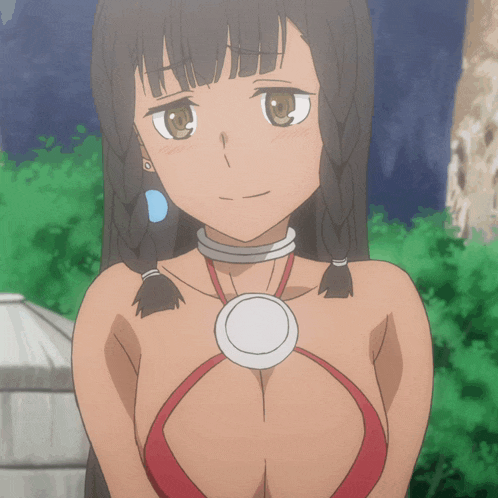 a girl with braids and a medal around her neck looks at the camera