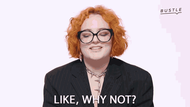 a woman with red hair and glasses is asking why not