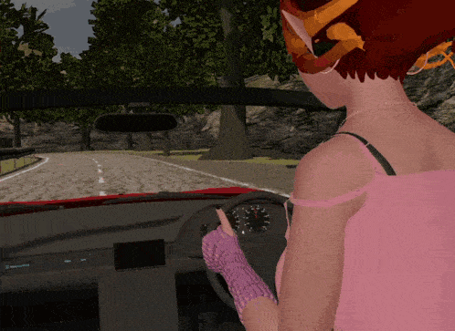 a woman in a pink tank top is driving a red car