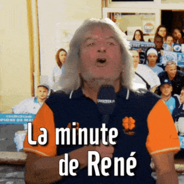 a man holding a microphone says la minute de rené