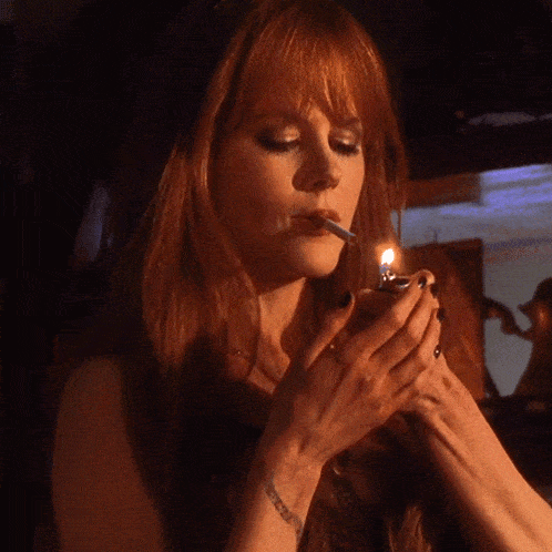 Lighting A Cigarette Gillian Owens GIF - Lighting A Cigarette Gillian Owens Nicole Kidman GIFs