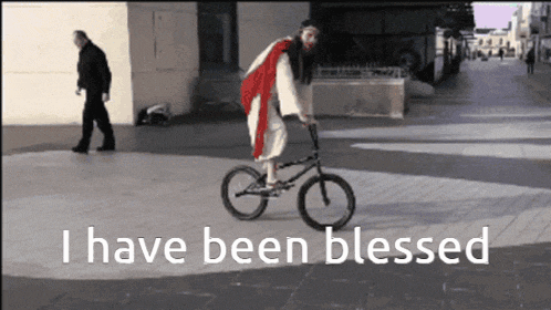 jesus is riding a bike with the words i have been blessed above him