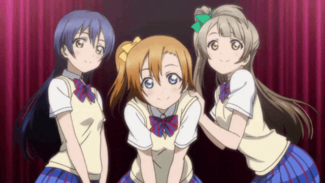 three anime girls are posing for a picture and one has a green bow in her hair
