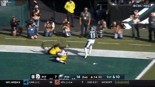 a football game between the eagles and the car is being shown on cbs