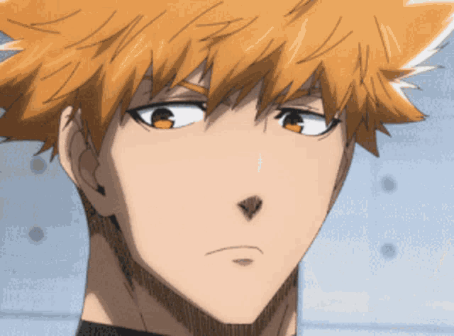 a close up of a man with orange hair