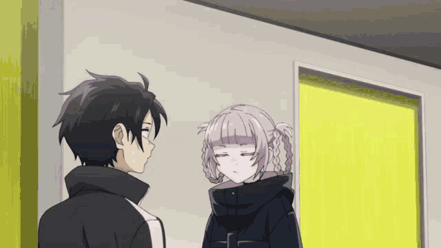 a man and a girl are standing next to each other in front of a yellow door