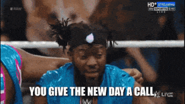 a man in a boxing ring says you give the new day a call
