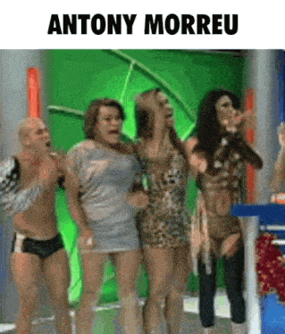 a group of people are dancing in front of a green background and the name antony morreu is on the bottom