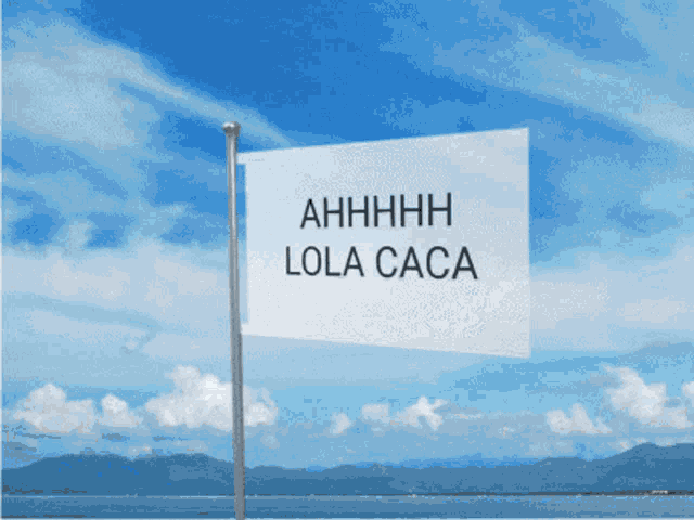 a flag that says ahhhh lola caca is flying in the wind