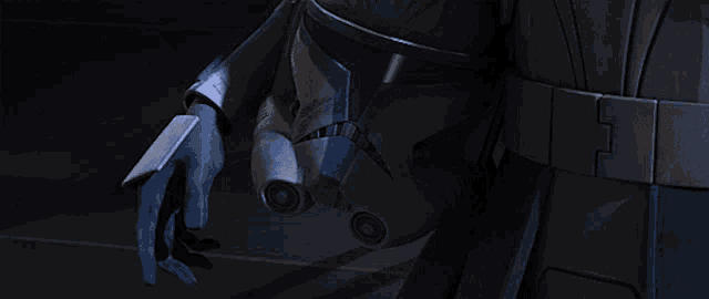a close up of a person 's arm with a glove on it