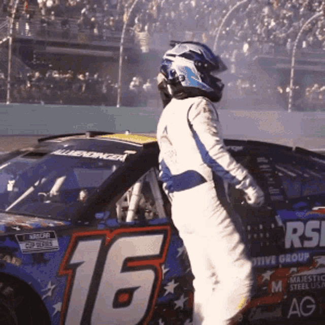 a racing car with the number 16 on it