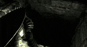 a knight with a sword and shield standing in a dark room
