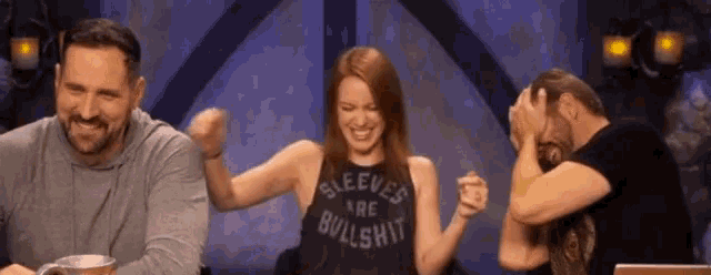 a woman in a tank top that says sleeves are bullshit