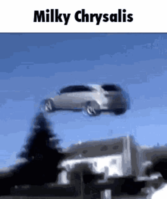 a car is flying through the air in a milky chrysalis advertisement .