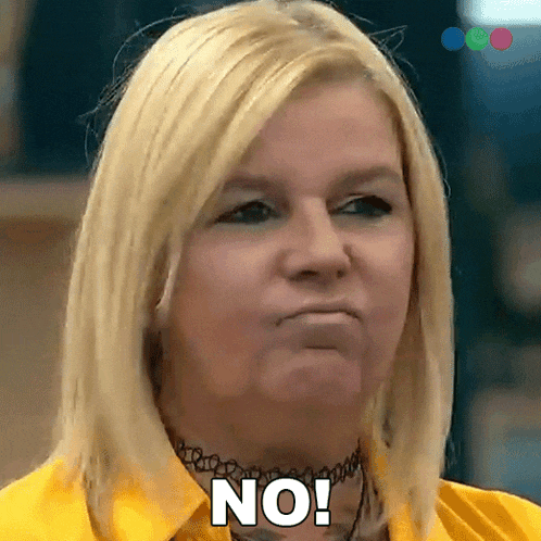 a close up of a woman 's face with the word no on it