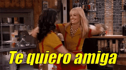 two women hugging each other in a restaurant with the words te quiero amiga on the bottom