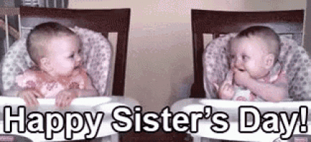 two babies are sitting in high chairs and eating food .