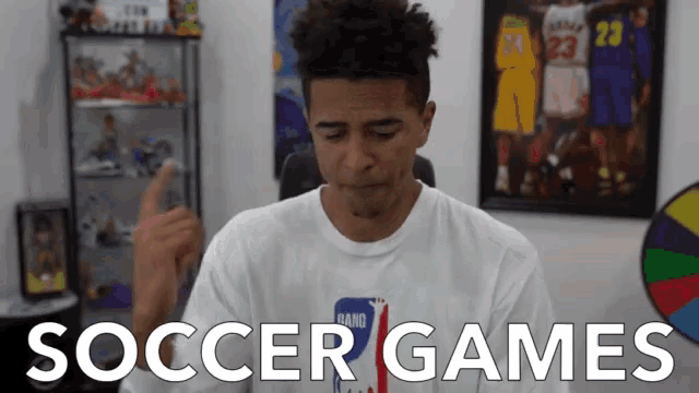 a man in a white shirt with the word soccer games on it