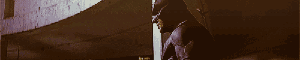 a close up of a person in a batman suit