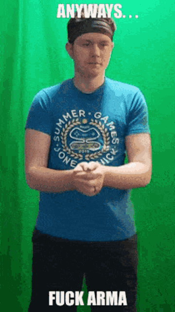 a man wearing a blue shirt that says " anyways " on it