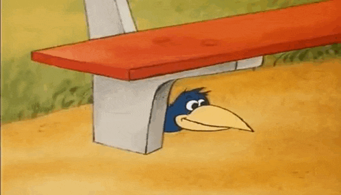 a cartoon of a bird peeking out from under a bench .