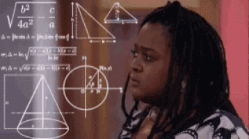 a woman is standing in front of a chalkboard with mathematical equations on it