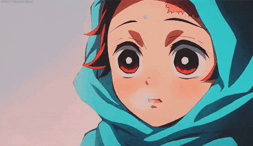 a close up of a person wearing a blue scarf and a hood .