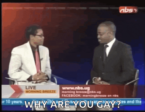 two men are sitting in front of a sign that says ' why are you gay '