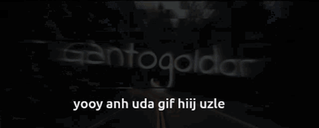 a sign that says ' gotogoldor ' on it in a blurry image