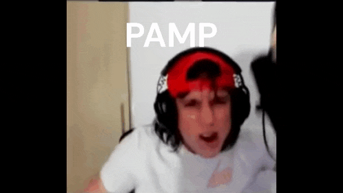 a man wearing headphones and a red hat is making a face .