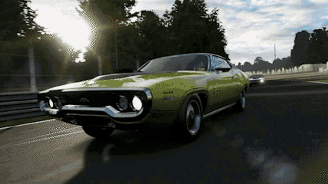 a green dodge charger is driving down a track
