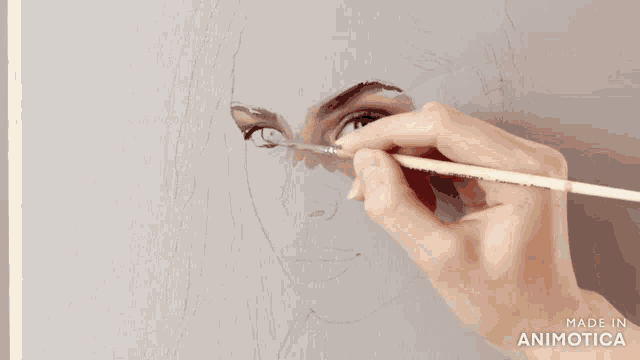 a person is painting a woman 's face with a brush made in animatica