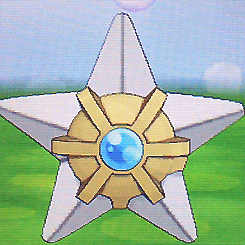 a star with a blue circle in the middle
