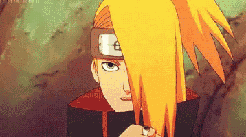 a close up of a cartoon character with long yellow hair