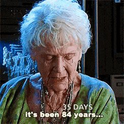 an elderly woman is crying and says `` 35 days it 's been 84 years ... '' .