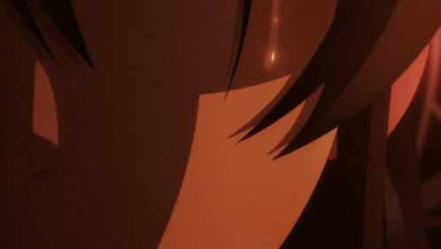 a close up of a person 's face with tears coming out of their eyes