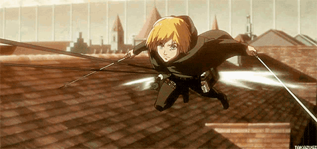 a man is flying through the air with a sword in his hand .