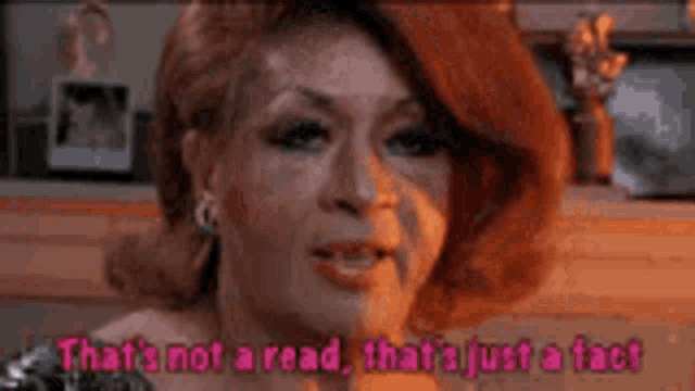 a woman with red hair is talking and says `` that 's not a read , that 's just a fact ''