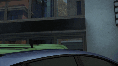 a man in a purple shirt is standing next to a purple sports car