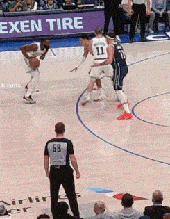 a basketball player with the number 11 on his back