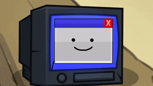 a computer monitor with a smiley face and a red x on the screen