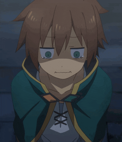 a boy with brown hair and green eyes is wearing a cape