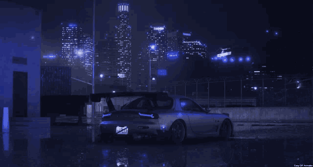 a car is parked in front of a city skyline with a license plate that says ap
